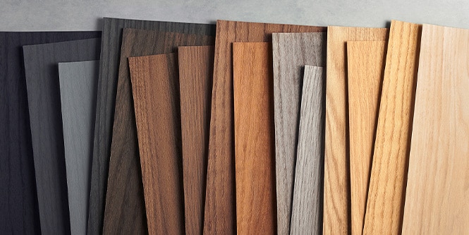 3M DINOC wood grain samples organized from black to light wood tones.
