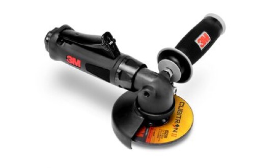 A 3M™ Cubitron™ II Wheel on a power tool.
