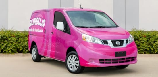 A fleet van wrapped in a pink pigmented film.
