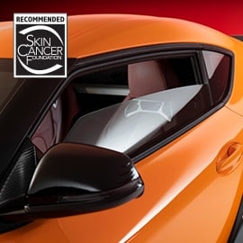 Exterior driver-side close-up of Obsidian window tint featuring Skin Cancer Foundation recommendation logo.