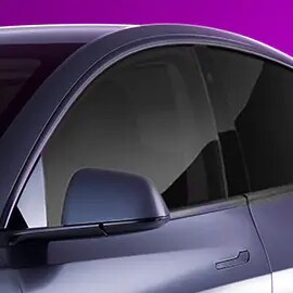 Exterior driver side close-up view of FX-HP series window tinting.