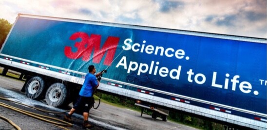 Washing fleet graphics for maintenance.
