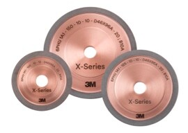Three bronze-coloured 3M™ Hybrid Diamond Grinding Wheels 6PHU in different sizes.