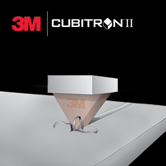 Illustration d’un grain abrasif travaillant une surface, avec le logo Cubitron II 3M affiché au-dessus.
