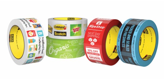 Five rolls of tape with different designs printed on them.
