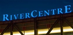 Blue illuminated letter signage that reads: River Centre.
