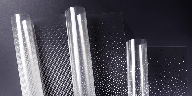 Trois rouleaux de finitions pour verre FASARA 3M présentant des motifs de dégradé de points.
