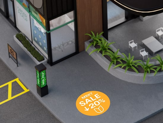  Devanture de magasin avec des enseignes lumineuses et un stationnement, montrant un mur vert et des camionnettes de livraison.
