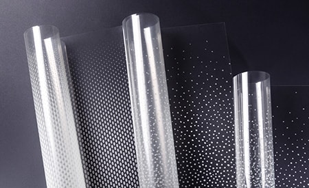 Trois rouleaux de finitions pour verre FASARA 3M présentant des motifs de dégradé de points.
