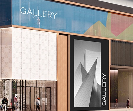 Close up of retail exterior with black and white image printed on opaque graphic and colourful pattern printed on transparent window film.
