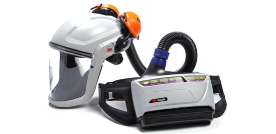 A face mask with protective earmuffs and a respiratory system.
