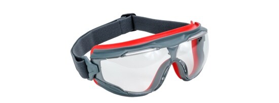 A pair of 3M™ Goggle Gear 501 Series Protective Goggles with grey and red frames and a dark grey elastic strap.

