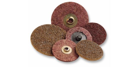 An assortment of various sized surface conditioning discs.
