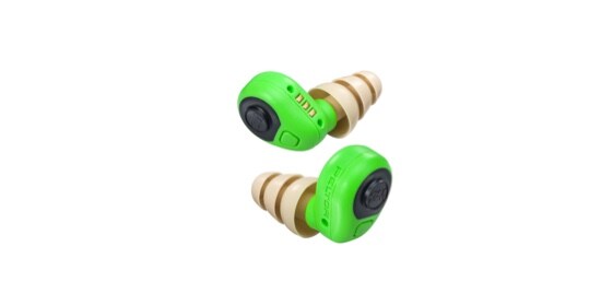 Two green earplugs with beige earpiece stems.
