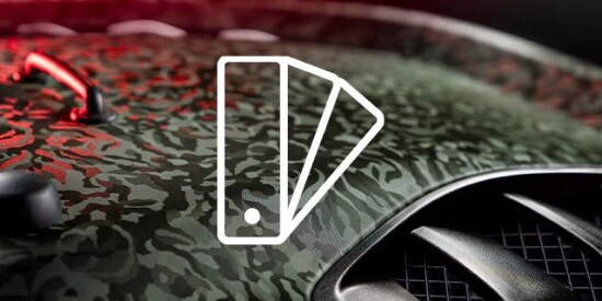 Icon of a paint colour swatch on top of a real car hood with camouflage pattern wrap film.
