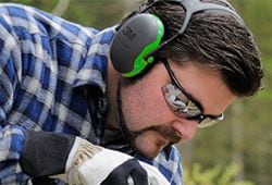A worker wearing 3M's Peltor and protective eyewear products.
