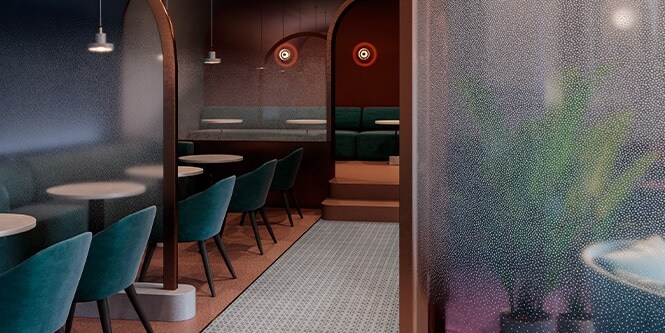 Intérieur d’un restaurant de prestige aux tonalités éclatantes, agrémenté de cloisons en verre habillées d’un fini 3M Glass Finish à motif de points dégradés.
